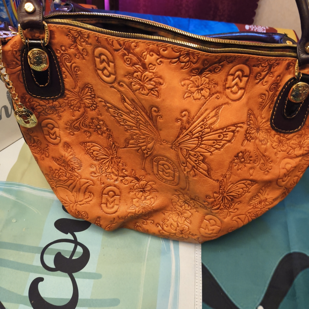 Marino Orlandi Orange Shoulder Bag with Embossed Patterns